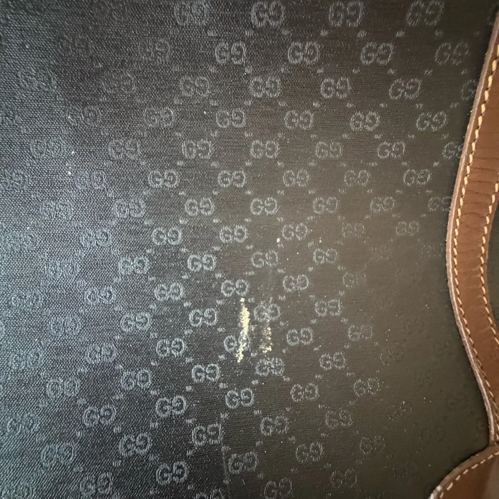 Gucci Black and Brown Vintage Travel Bag with micro GG logo pattern